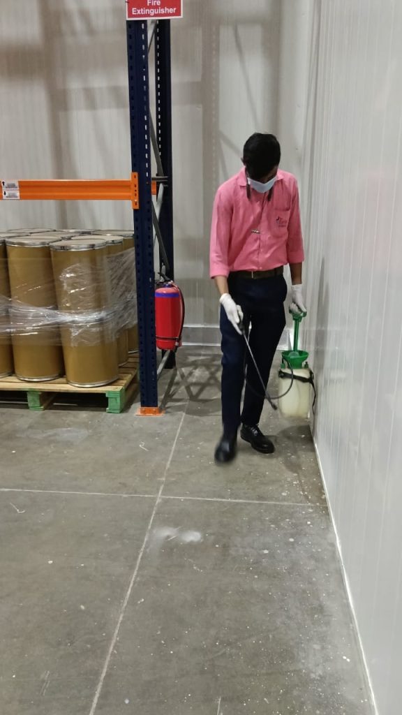 Star Link Pest Control technician providing a professional warehouse treatment